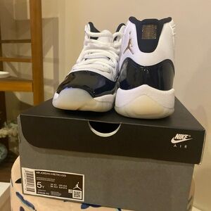 Air Jordan 11 Retro Grade School Sneaker White / Metallic Gold-Black Size 5Y
